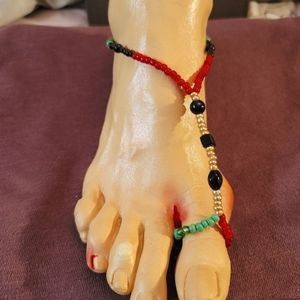 Barefoot Sandal- handmade. Red, black, green and gold.